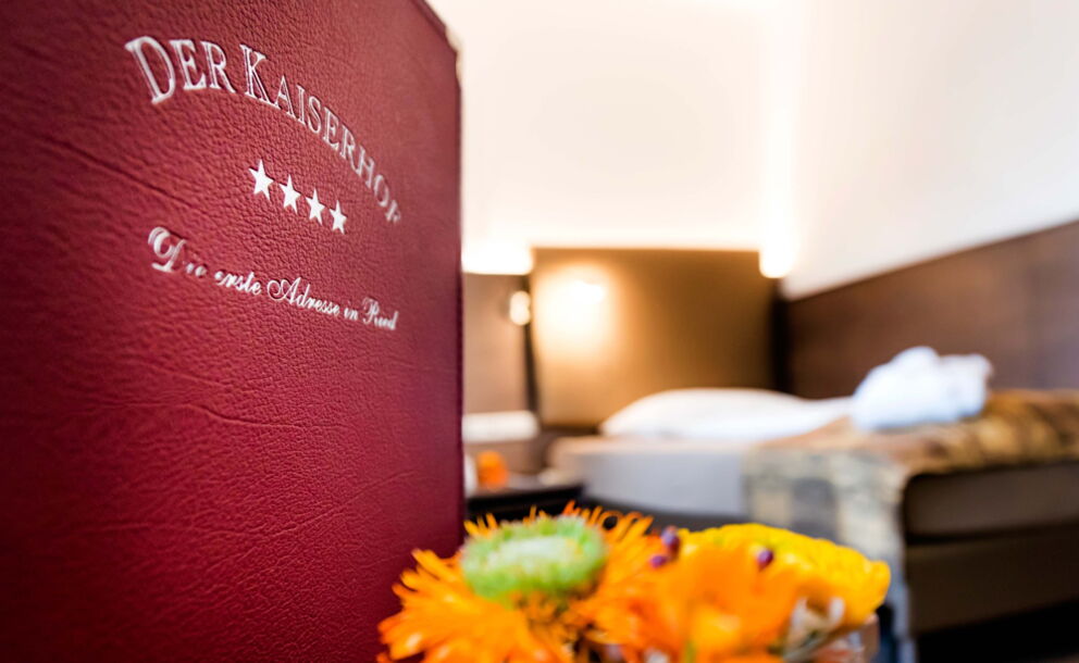 The guest folder in the Hotel der Kaiserhof made of red leather cover