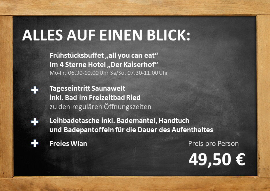 An inscribed board with information about the Bath & Breakfast offer at Hotel Der Kaiserhof