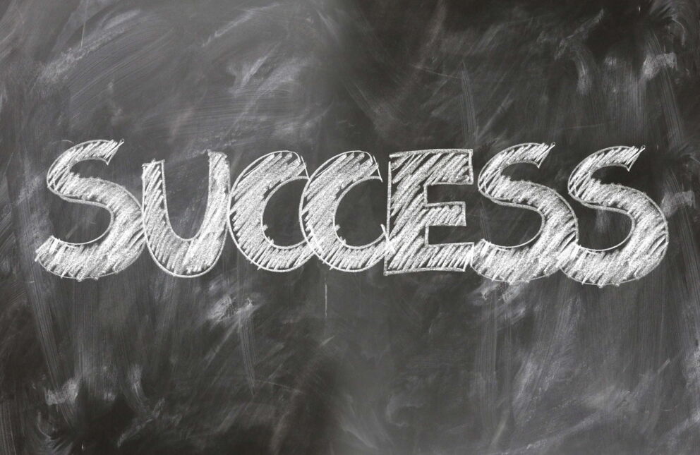 The word "Success" written in chalk on a blackboard.