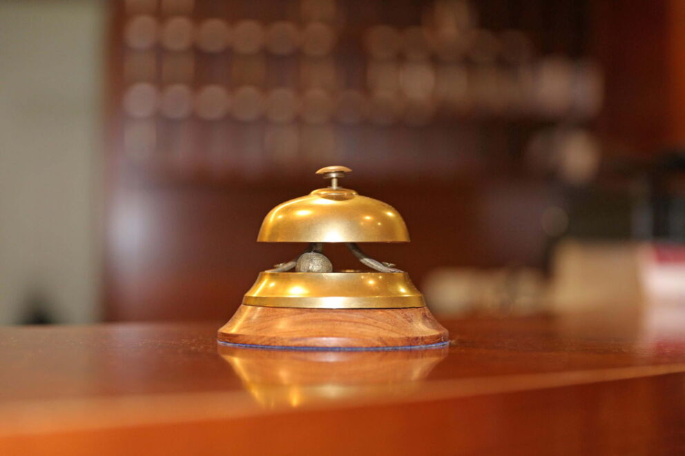 The golden reception bell at the reception of the Hotel Der Kaiserhof
