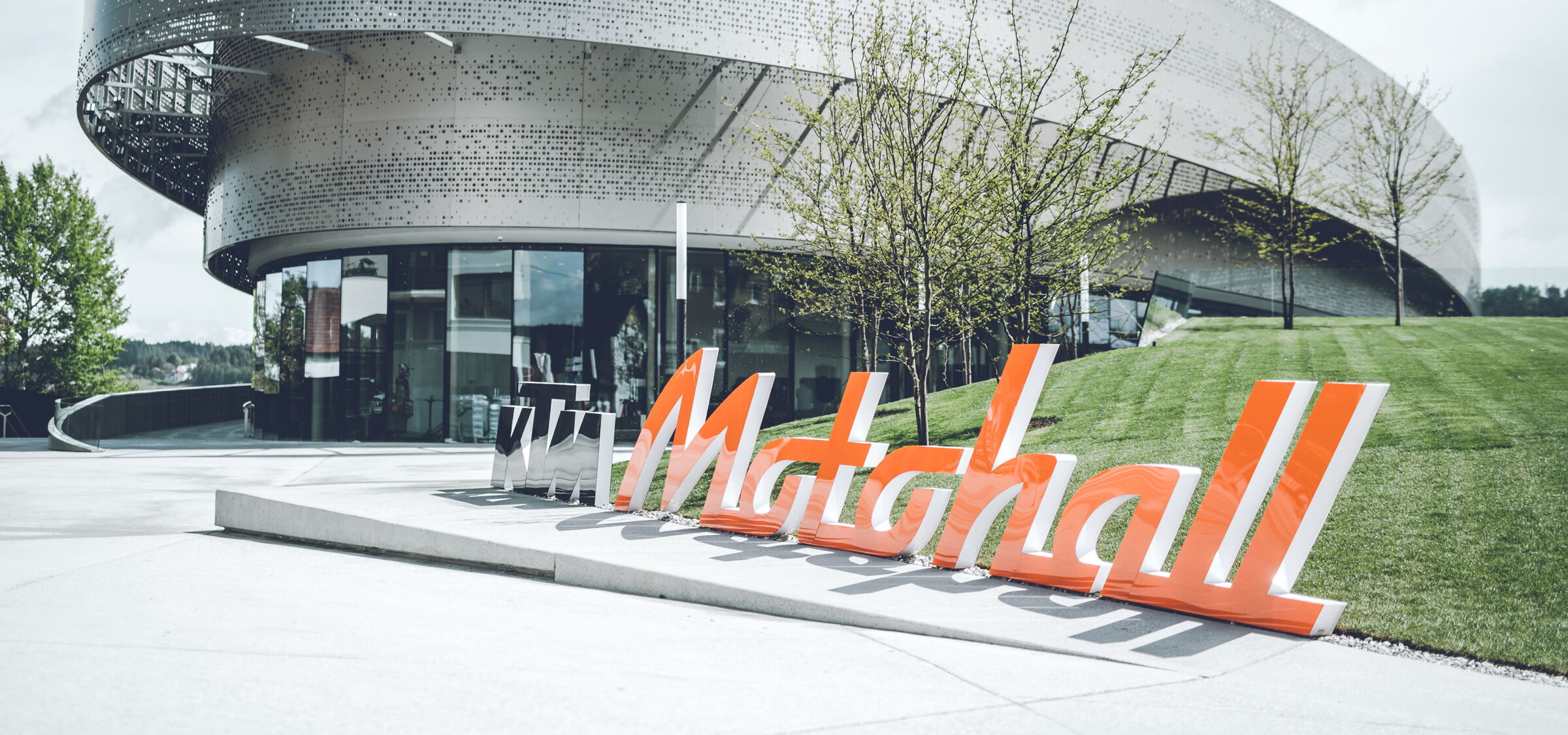 The entrance area of the KTM Motohall in Mattighofen from the outside